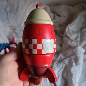 Red and Cream Rocket Musical Toy